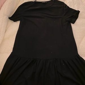 Black dress with ruffle at bottom